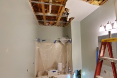 Ceiling and wet insulation removed from water damage
