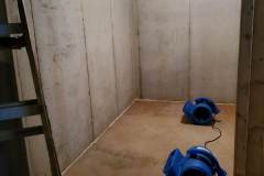 air movers drying out sub floor from water damage