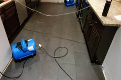 air movers drying under cabinets