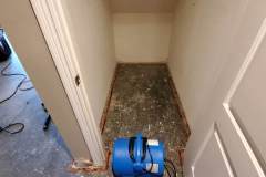 air mover drying out closet under the stairs
