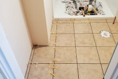 completed laying tile for bathroom remodel