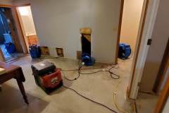 water damage under stairs